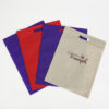 Eco friendly d cut non woven clothing die cut store shopping tote nonwoven bag